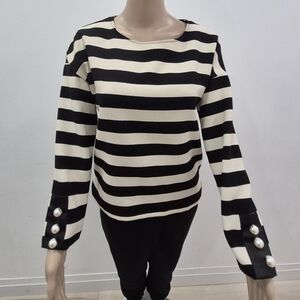 Long-sleeved striped t-shirt with pearl details on the sleeves. Zara size Medium